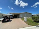 Exquisite home w/a lake & golf course view! Metal roof 3 yrs old for sale in Indiantown Florida Martin County County on GolfHomes.com