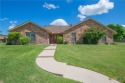 This custom corner lot home in the gorgeous Turkey Creek Estates for sale in Copperas Cove Texas Coryell County County on GolfHomes.com