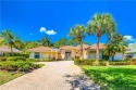 Discover serene living in this beautifully designed courtyard for sale in Palm City Florida Martin County County on GolfHomes.com