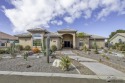 This custom Mesa Del Sol Golf Course home offers 3BR/3BA and a 3 for sale in Yuma Arizona Yuma County County on GolfHomes.com