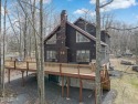 Step onto the lush fairways of The Hideout golf course right for sale in Lake Ariel Pennsylvania Wayne County County on GolfHomes.com