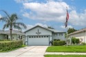Welcome to your new home in this highly sought-after 55+ gated for sale in Land O Lakes Florida Pasco County County on GolfHomes.com