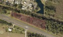 3.11 +/- acres per 2008 survey with 870' frontage on SR 44 for sale in Leesburg Florida Lake County County on GolfHomes.com