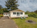 ''Lakeview Cottage!''  After a day of fishing enjoy relaxing on for sale in Neotsu Oregon Lincoln County County on GolfHomes.com