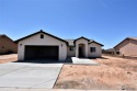 Stunning New Construction in Butterfield Golf Course! This for sale in Wellton Arizona Yuma County County on GolfHomes.com