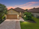 Stunning 3BR/3BA home on a pond located in the gated Esplanade for sale in Bradenton Florida Manatee County County on GolfHomes.com