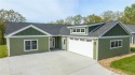 Superb NEW construction home! This single level, no stairs, FLAT for sale in Sunrise Beach Missouri Camden County County on GolfHomes.com