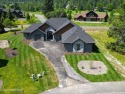 Welcome to the epitome of luxury living at the Golfers Retreat for sale in Sandpoint Idaho Bonner County County on GolfHomes.com