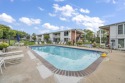 PRIME LOCATION in OKOBOJI! It's golf, pool, beach, and location for sale in Okoboji Iowa Dickinson County County on GolfHomes.com