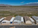 Welcome to this gorgeous single-story manufactured home for sale in Pahrump Nevada Nye County County on GolfHomes.com