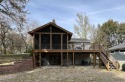 Welcome to Triboji--one of the best-kept secrets on the North for sale in Spirit Lake Iowa Dickinson County County on GolfHomes.com