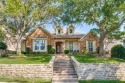 Step into a true showstopper in The Shores by Ray Hubbard. This for sale in Rockwall Texas Rockwall County County on GolfHomes.com