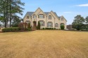 GORGEOUS FULL PAINTED BRICK BEAUTY ON THE 18TH HOLE IN for sale in Fayetteville Georgia Fayette County County on GolfHomes.com