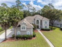 Elegant Pool Home in Eagle Harbor with view of the golf course for sale in Fleming Island Florida Clay County County on GolfHomes.com