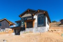Experience elevated mountain living in this stunning new for sale in Granby Colorado Grand County County on GolfHomes.com