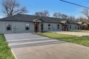 This triplex is tailor-made for the astute investor! Spacious for sale in Wylie Texas Dallas County County on GolfHomes.com