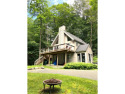 Section A - end of the road, low on the Hill, this Chalet style for sale in Wilmington Vermont Windham County County on GolfHomes.com
