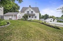 Move right in to this charming, well-maintained cape on a for sale in Manchester New Hampshire Hillsborough County County on GolfHomes.com