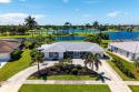 IT IS ALL ABOUT THE LOCATION. This home sits on a lake looking for sale in Marco Island Florida Collier County County on GolfHomes.com
