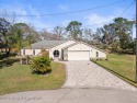 Beautiful well-loved home at the end of a cul-de-sac and on the for sale in Spring Hill Florida Hernando County County on GolfHomes.com