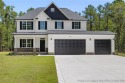 Discover your dream home where elegance meets functionality in a for sale in Wagram North Carolina Scotland County County on GolfHomes.com