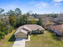 Welcome to this beautiful home, built in 2022 and offering the for sale in Spring Hill Florida Hernando County County on GolfHomes.com