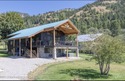 Discover elevated mountain living in this stunning 6-bedroom for sale in Star Valley Ranch Wyoming Lincoln County County on GolfHomes.com