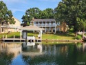Enjoy stunning sunset lake views from this charming all-brick for sale in Bonne Terre Missouri St. Francois County County on GolfHomes.com