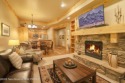 This fully furnished second floor, 2-bedroom, 2-bathroom for sale in Victor Idaho Teton County County on GolfHomes.com