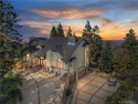 Experience the ultimate mountain retreat with this stunning for sale in Lake Arrowhead California San Bernardino County County on GolfHomes.com