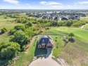 Located on almost an acre lot at the 7th & 8th hole of the for sale in Gunter Texas Grayson County County on GolfHomes.com