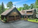 LAKEFRONT LOG DREAM HOME!  Real authentic log home nestled on for sale in Hawley Pennsylvania Pike County County on GolfHomes.com