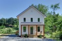 Experience modern sustainability in this brand-new NET-ZERO for sale in Asheville North Carolina Buncombe County County on GolfHomes.com