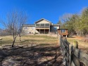 Beautiful spacious two story home nestled on 1+ acres across for sale in Hayesville North Carolina Clay County County on GolfHomes.com