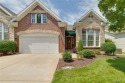 STUNNING 1.5 story villa overlooking the 8th green of for sale in O Fallon Missouri St. Charles County County on GolfHomes.com