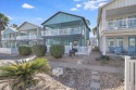 Check out this 3 story Banyan Beach Property with gulf views and for sale in Port Aransas Texas Nueces County County on GolfHomes.com