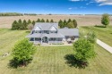 Step into timeless elegance with this stunning two-story for sale in Dyersville Iowa Dubuque County County on GolfHomes.com