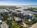 Experience your perfect Retreat! Discover luxury waterfront for sale in Placida Florida Charlotte County County on GolfHomes.com