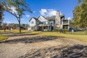 This beautiful home features wide porches and wrap-around for sale in Idabel Oklahoma McCurtain County County on GolfHomes.com