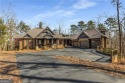 Experience the pinnacle of luxury living with this extraordinary for sale in Big Canoe Georgia Pickens County County on GolfHomes.com