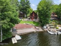 Roamingwood Lakefront Home with Stunning Straight-On Views - for sale in Lake Ariel Pennsylvania Wayne County County on GolfHomes.com