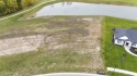 Daylight/possible walkout lot with views of a pond located for sale in Auburn Indiana De Kalb County County on GolfHomes.com