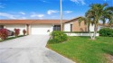 Enjoy the best of Naples living in this charming villa, ideally for sale in Naples Florida Collier County County on GolfHomes.com