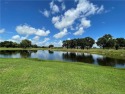Panoramic lake & golf course view! This large 3 BR, 2 bath + den for sale in Indiantown Florida Martin County County on GolfHomes.com