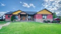 Welcome to this charming custom home on 1.11 acres with for sale in Gillette Wyoming Campbell County County on GolfHomes.com