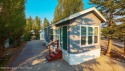 Discover a charming park model in the heart of Star Valley Ranch for sale in Thayne Wyoming Lincoln County County on GolfHomes.com