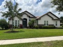 Beautiful Former Model Home in Red Tail's gated community on a for sale in Sorrento Florida Lake County County on GolfHomes.com