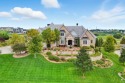 Experience refined elegance in this custom estate on Colbert for sale in Manhattan Kansas Riley County County on GolfHomes.com