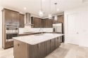 LOWEST priced SINGLE FAMILY home in Esplanade Golf  Country Club for sale in Naples Florida Collier County County on GolfHomes.com