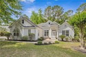 Charming Lowcountry home nestled on a corner lot at the end of a for sale in Bluffton South Carolina Beaufort County County on GolfHomes.com